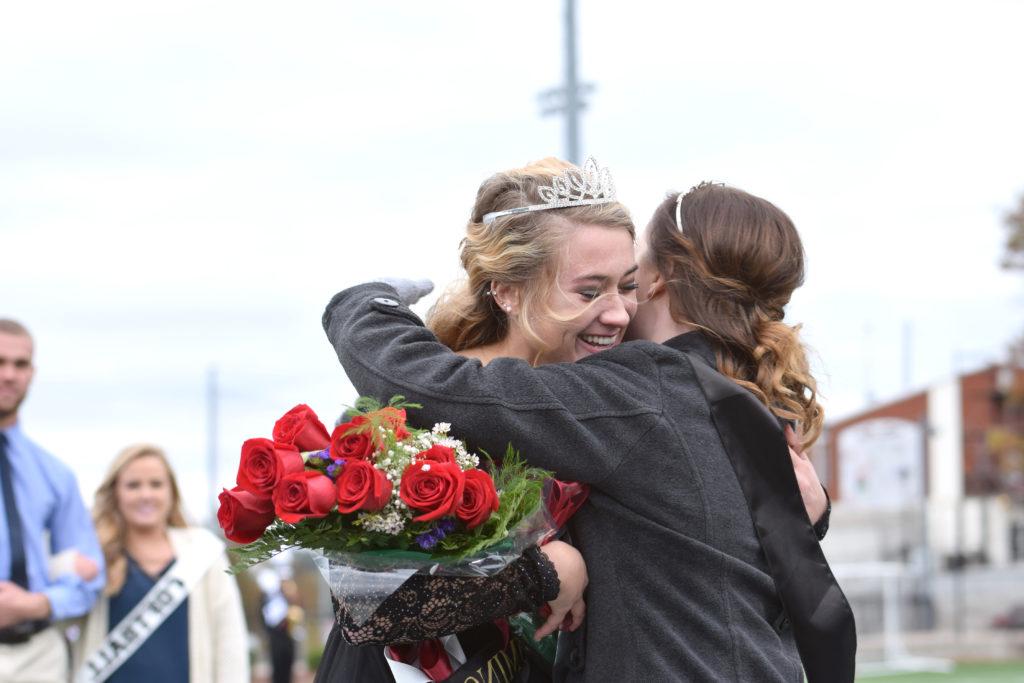 Jesslyn McCandless, left, 2016 Homecoming queen congratulates Rachel Mobley on becoming the 2017 Homecoming queen at Campbellsville University. (Campbellsville University Photo by Ariel Emberton)